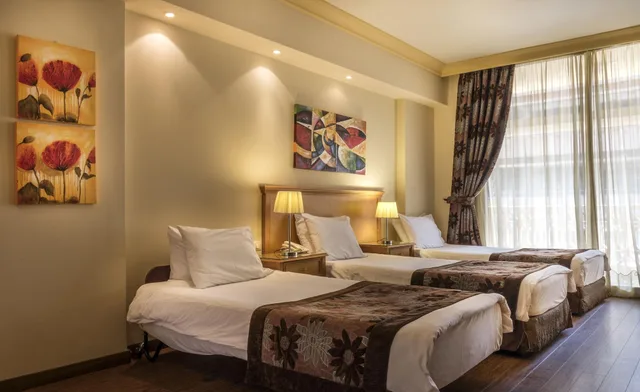 Standard Triple Room:، Bella Riva Suite Hotel 1/3