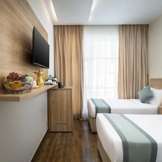 غرفة بسريرين منفصلين، فندق وورث إيليت(Worth Elite Hotel) 4/10