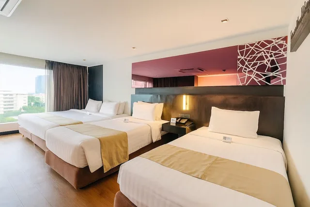 جناح عائلي بسريرين منفصلين وسرير كينج، Golden Tulip Mandison Suites 2/3