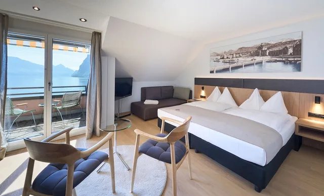 غرفة سوبيريور بسريرين منفصلين بإطلالة على البحيرة بشرفة مع أريكة، Seehotel Kastanienbaum 1/10