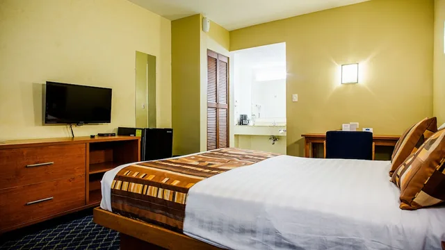 غرفة بسريرين مزدوجين، American Inn Hotel Suites Delicias 3/4
