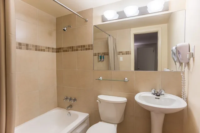 غرفة سوبيريور بسرير كوين بإطلالة على النهر، Motel Et Appartements Du Fleuve 3/3