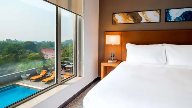 غرفة بسرير كينج مع أريكة، Hyatt Place Gurgaon/Udyog Vihar 1/4