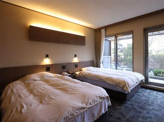غرفة بسريرين منفصلين بإطلالة على الحديقة بحوض استحمام لذوي الإعاقة، Miyahama Grand Hotel 1/2