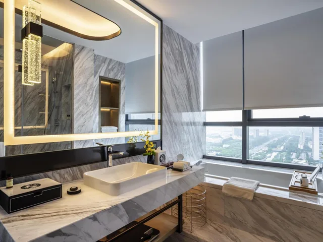 غرفة ديلوكس بسرير كينج وسرير كوين، Pullman Suzhou Zhonghui 5/5