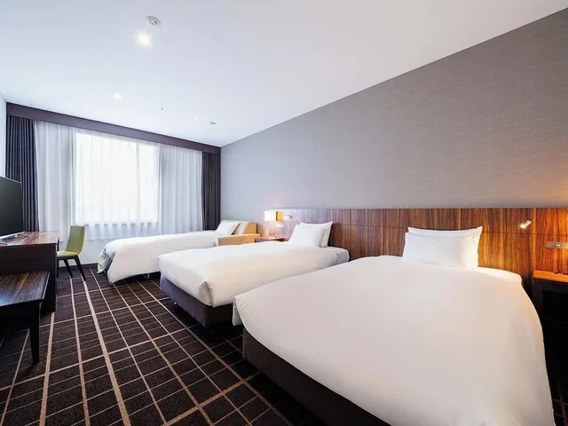 غرفة بسريرين منفصلين مع أريكة، JR East Hotel Mets Utsunomiya 1/4
