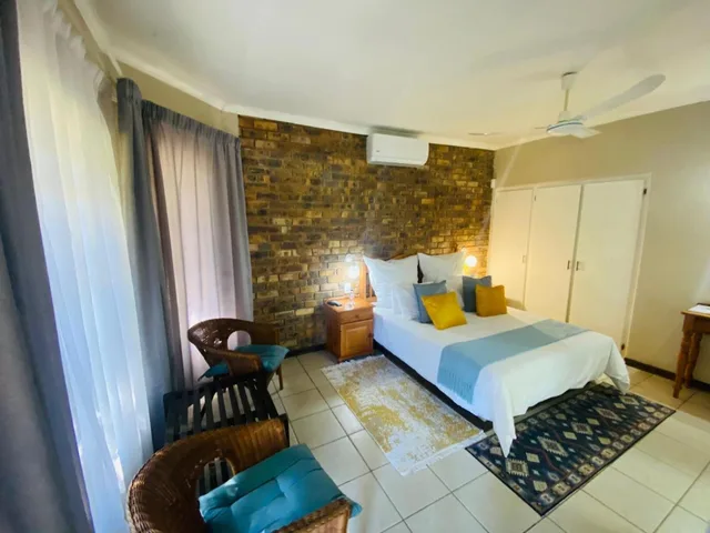 غرفة قياسية بسرير كوين، Shingalana Guest House 1/3
