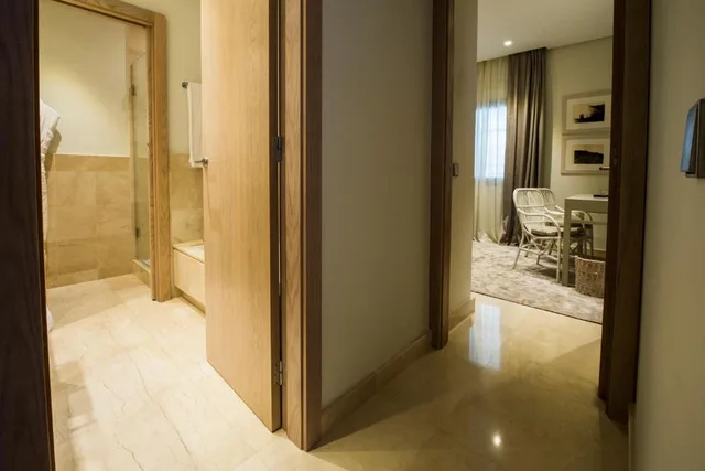 جناح مفرد بـ3 غرف نوم بإطلالة جزئية على البحر، Las Terrazas de Abama Suites 7/7