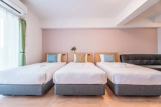 غرفة عائلية بثلاثة أسرّة مع أريكة في طابق مرتفع، Eslead Hotel Namba South I 2/10