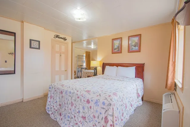 Room, 2 Double Beds, Sunflower Motel Hiawatha By OYO 2/10