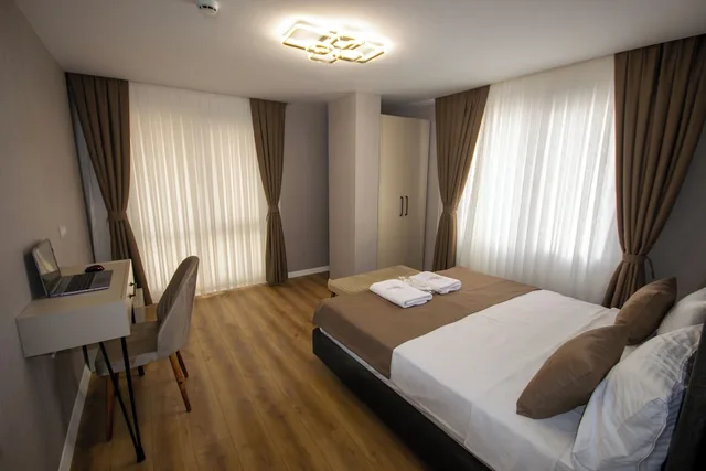 جناح عائلي ديلوكس بسريرين منفصلين مع أريكة، Luxury Life Suites 4/9