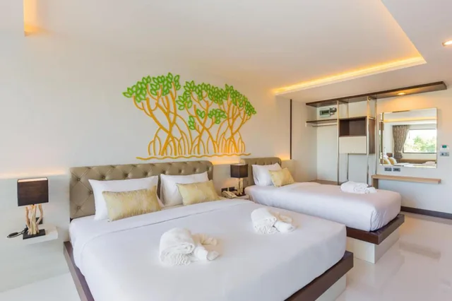 غرفة ديلوكس ثلاثية بسرير مزدوج وسرير فردي بشرفة، River Front Krabi Hotel 3/5