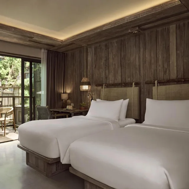 جناح بسريرين منفصلين وسرير كينج بإطلالة على الحديقة بغرفتي نوم، Dinso Resort 1/18