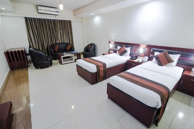 غرفة بريميوم بسريرين منفصلين بغرفة نوم واحدة، HOTEL AVN GRAND 1/4