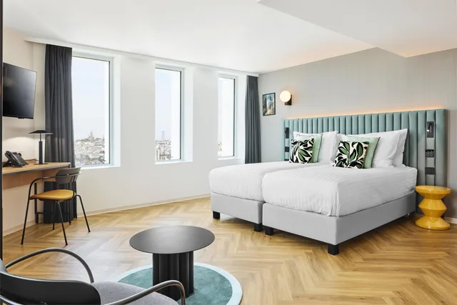 غرفة ديلوكس بسرير مزدوج في طابق مرتفع، H4 Wyndham Paris Pleyel 6/8