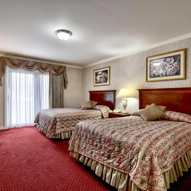 غرفة ديلوكس بسرير مزدوج بشرفة، Roosevelt Inn And Suites 1/10