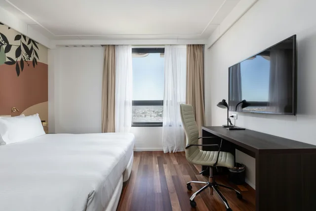 غرفة بسرير كينج لذوي الإعاقة، DoubleTree by Hilton Florence Metropole 5/7