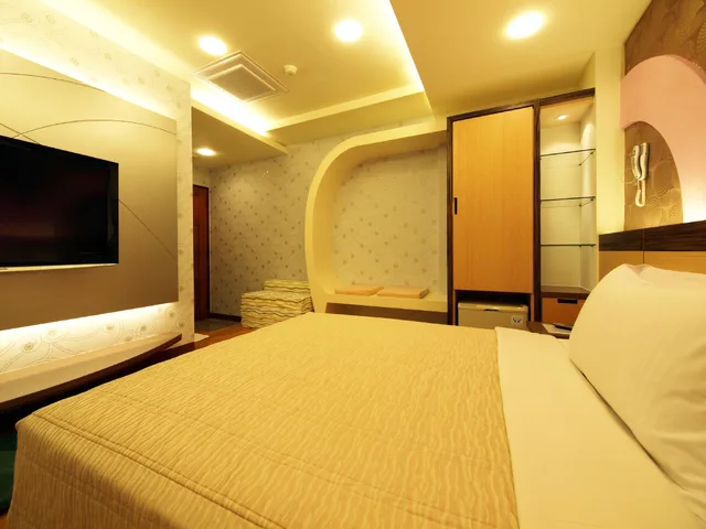 غرفة بسرير كوين وسرير مزدوج، Ibiza Kenting Hotel II 3/3