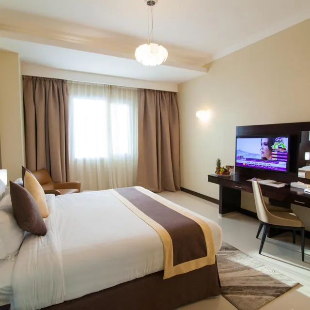 غرفة ديلوكس بسرير كينج، Premier Hotel 1/7