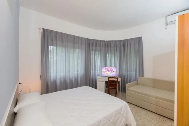 غرفة رباعية بسرير كوين وسرير بطابقين، Hotel Costa Verde 1/3