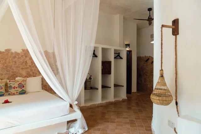 غرفة ديلوكس ثلاثية بسرير كينج وسرير فردي بإطلالة على الحديقة، Mvuvi Boutique Resort 6/10