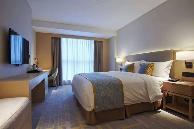 غرفة سوبيريور بسرير كينج للمدخنين، Howard Johnson By Wyndham Glory Plaza Chenghai 1/1