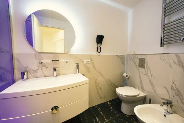 غرفة قياسية رباعية بسرير كوين وسريرين منفصلين بإطلالة على المدينة، San Pietro Grand Suite 4/5