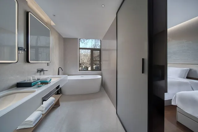 غرفة عائلية رباعية بسرير كوين بحوض استحمام، SSAW Garden Hotel Beijing 3/3