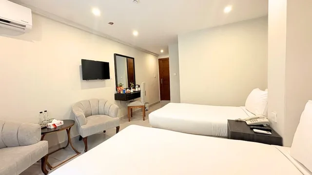غرفة ديلوكس بسريرين منفصلين، ENVOY CONTINENTAL HOTEL 2/5