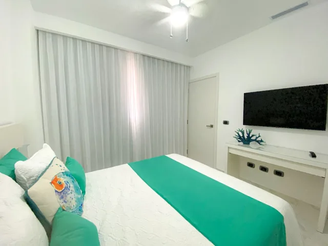 شقة حصرية بسريرين مزدوجين بإطلالة على المسبح بشرفة بغرفتي نوم مع أريكة، Xeliter Cana Rock Punta Cana 1/9
