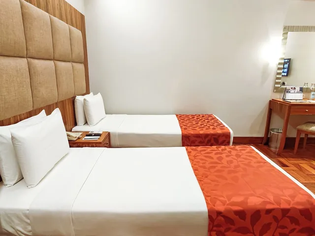 غرفة قياسية بسريرين منفصلين، City Garden Suites Manila 1/7