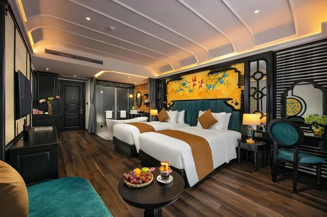 غرفة ديلوكس بسرير مزدوج أو سريرين منفصلين بشرفة، Grand Sunrise Palace Hoi An 1/1