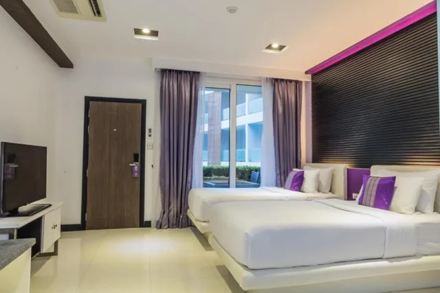 غرفة ديلوكس بسريرين منفصلين بإطلالة على المسبح، The L Resort Krabi 1/4