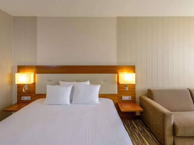 غرفة تنفيذية بسرير كينج، Movenpick Hotel Geneva 7/7