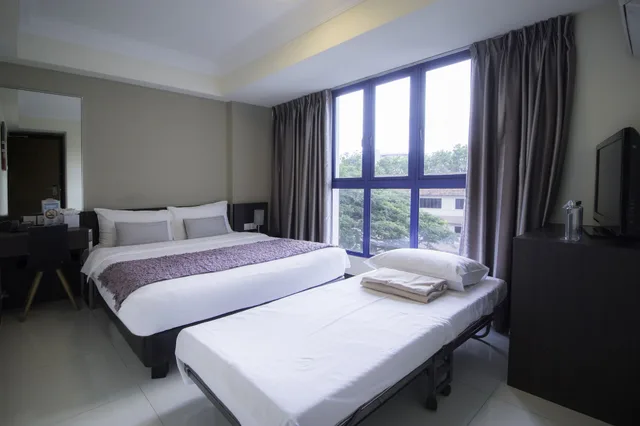 غرفة أساسية ثلاثية بسرير كوين، Harbour Ville Hotel 2/3
