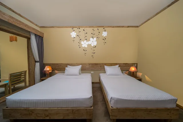 غرفة ديلوكس بسريرين منفصلين بإطلالة على الحديقة، LAHANA RESORT PHU QUOC 3/5