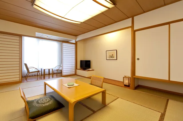 غرفة يابانية بفرشتي فوتون، KAMENOI HOTEL Aomori Makado 1/1