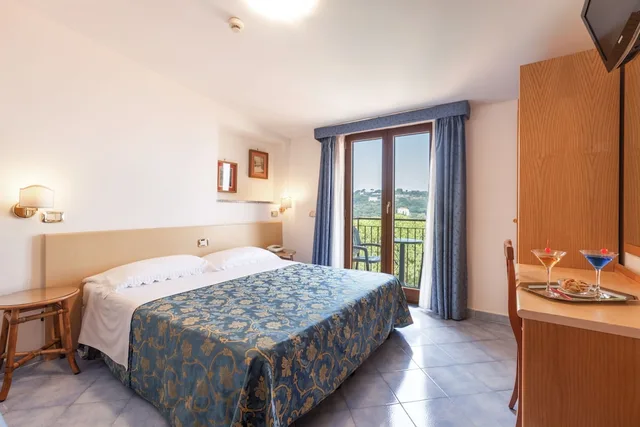 غرفة قياسية بسرير مزدوج أو سريرين منفصلين، Hotel La Pergoletta 1/3