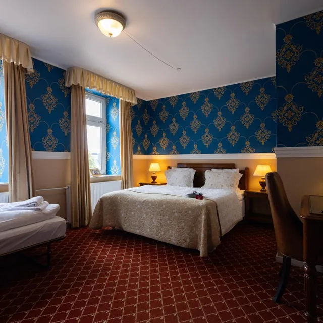 غرفة بسرير مزدوج أو سريرين منفصلين مع سرير إضافي، Milling Hotel Plaza 2/10