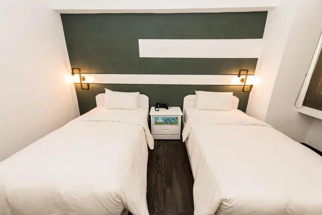 غرفة قياسية بسريرين منفصلين، Traveller Inn Mido Hotel 2/6