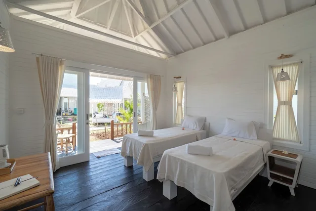 غرفة ديلوكس بسريرين منفصلين بإطلالة على الحديقة، Paus Putih Hotel Lembongan 3/4