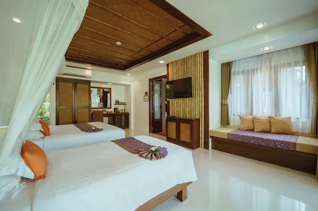 كوخ بريميير ثلاثي بسرير مزدوج وسرير فردي، Ban Sainai Resort - SHA Extra Plus 9/10
