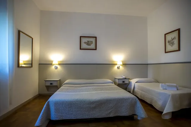 غرفة كومفورت ثلاثية بسرير كوين وسرير فردي، Hotel Ai Tufi 4/10