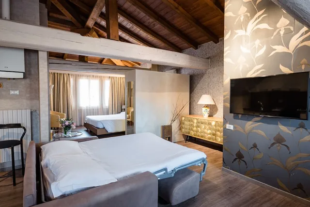 استوديو بأربعة أسرّة في الملحق، Albergo Centrale Bologna 7/10