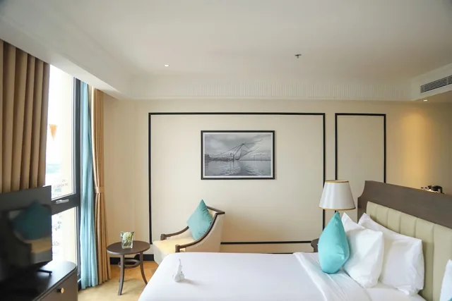 غرفة بريميير ديلوكس بسريرين منفصلين، Charmant Suites a Boutique Hotel Can Tho 1/4