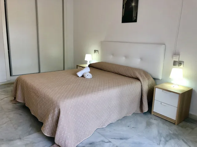 شقة بأربعة أسرّة بإطلالة على الحديقة بشرفة بغرفتي نوم مع أريكة، Las Rosas de Capistrano 2/7