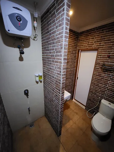 غرفة ديلوكس بسريرين منفصلين، Hotel Diafan Purwodadi 3/4