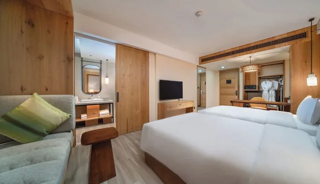 غرفة قياسية بسريرين مزدوجين في طابق مرتفع، Holiday Inn Jilin Beidahu 3/8