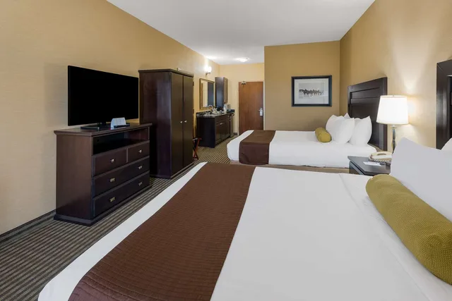غرفة بسريرين كوين يُسمح فيها بالحيوانات الأليفة، Best Western Sunrise Inn and Suites 2/4