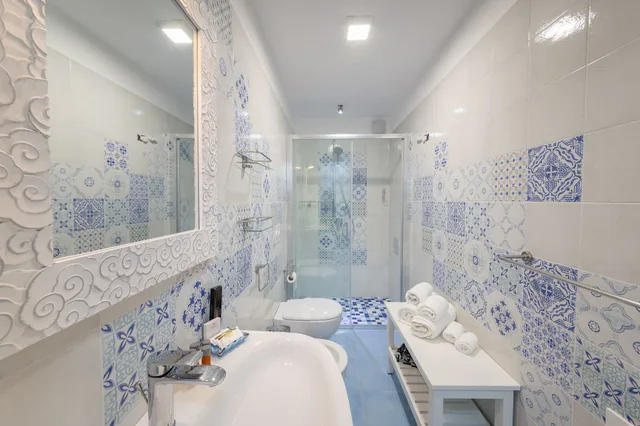 غرفة بريميوم رباعية بسرير كوين وسريرين منفصلين، Quattrocuori Room & Relax 3/3